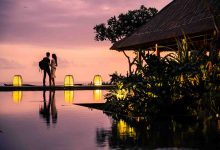 A young couple enjoying the lovely sunset at a res