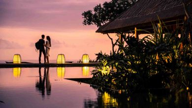 A young couple enjoying the lovely sunset at a res
