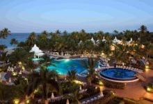 Pool in tropical resort at dusk