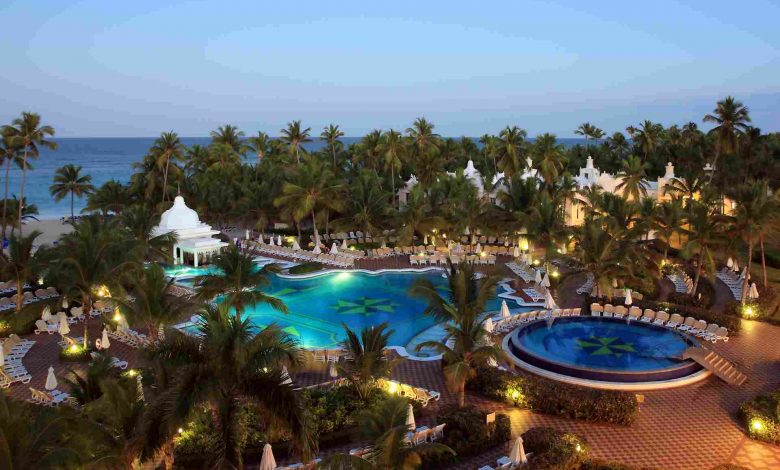 Pool in tropical resort at dusk