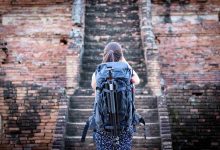 Asian beautiful girl has travel and take a photo a