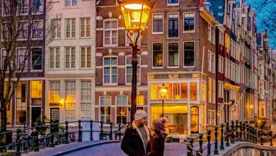 Amsterdam at night couple men and women on a city