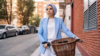 Vertical image of a muslim woman wearing a blue li